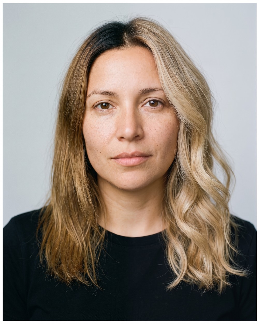 A balayage colour transformation shown as one image: the client’s original hair on the left, the finished colour on the right, meeting in a soft blended seam.